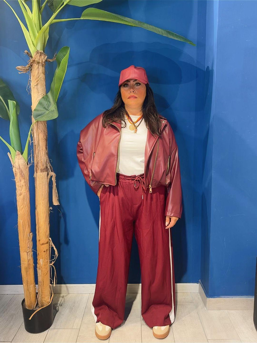 GIUBBINO IN ECOPELLE CON ZIP CURVY